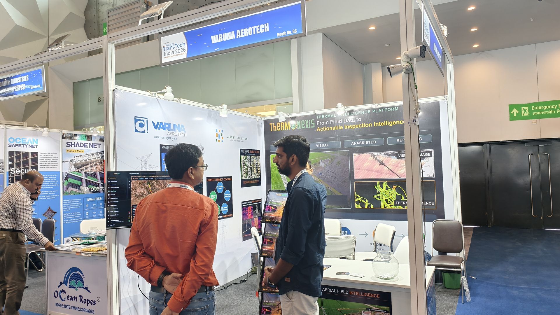 Varuna Aerotech team member demonstrating the inspection dashboard to a visitor at TransTech India 2026