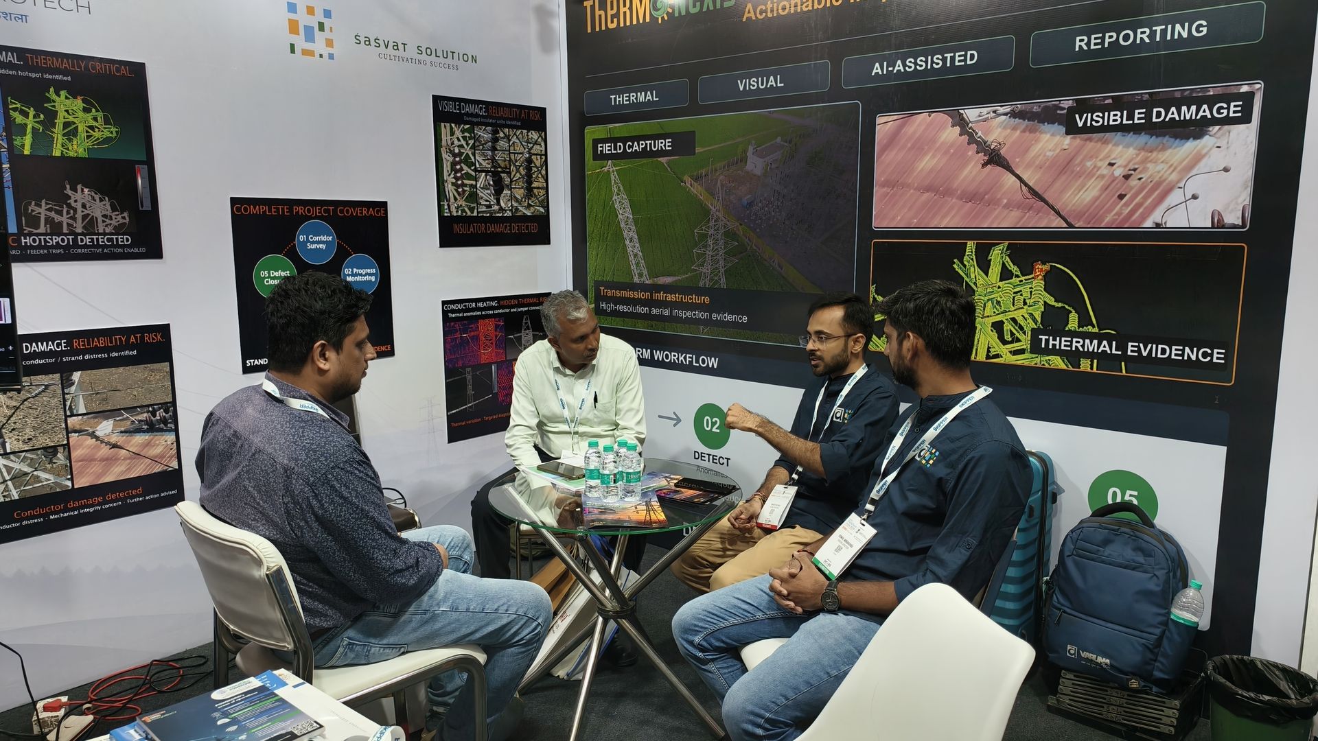 Varuna Aerotech team briefing visitors on thermal drone inspection findings at TransTech India 2026